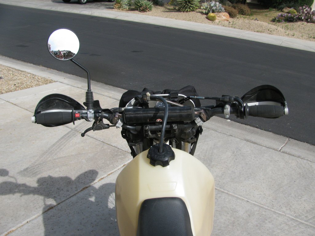 Tusk T-10 Aluminum, CR Mid Bend handlebars mounted on a 1993 Suzuki DR350.