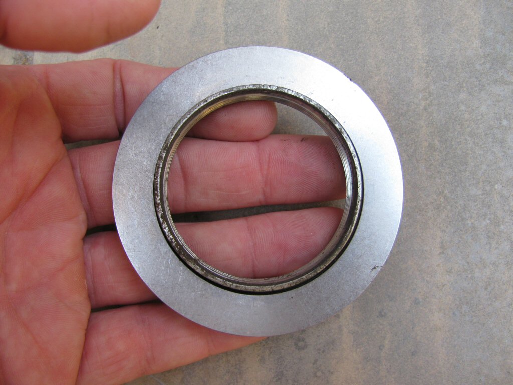 Needle roller thrust bearing used to ease shock preload adjustments on a Suzuki DR350.