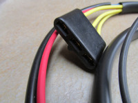 Flat 3 terminal connection for the voltage rectifier. The flat connector pictured is no longer available. You may reuse your original connector, or fit the individual insulators provided.