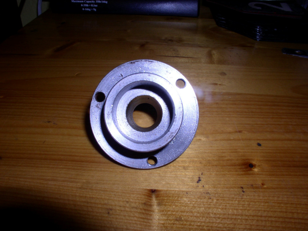 Crankshaft pulley adapter for using later crankshafts.