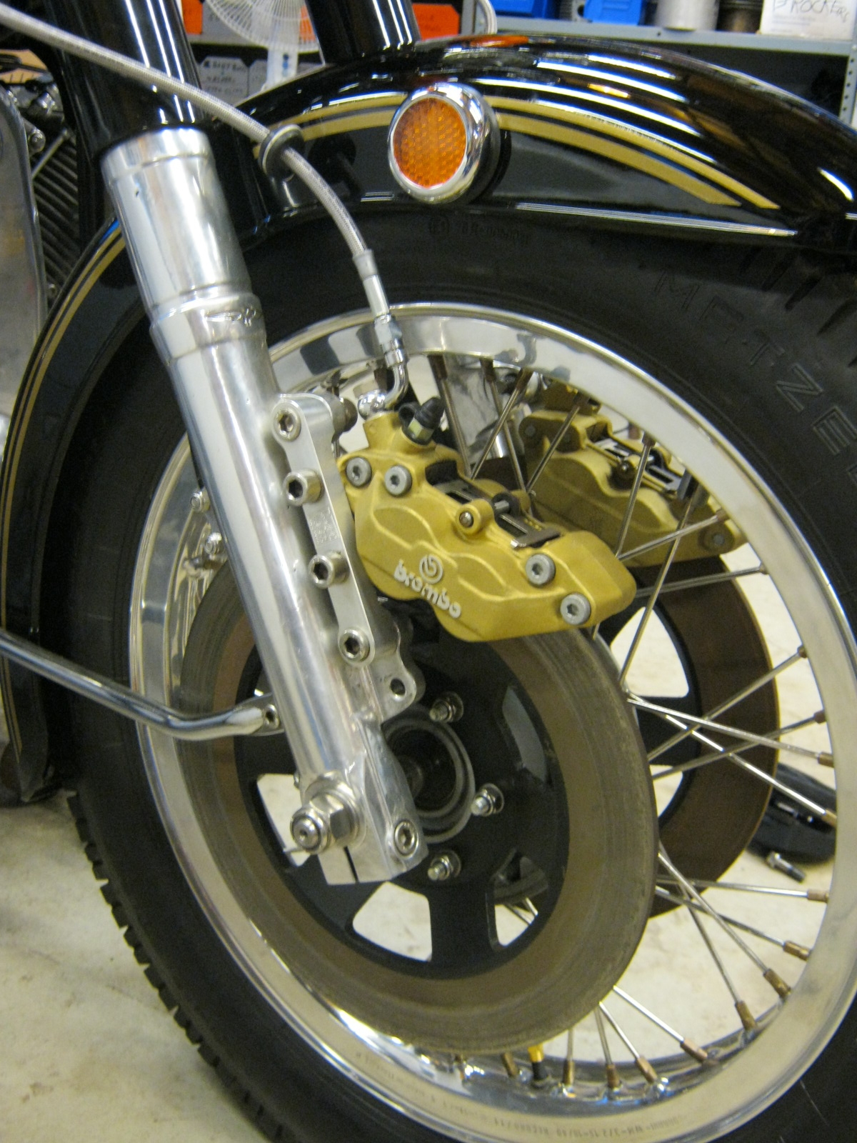 Disc brake configuration using 4 piston calipers. Applicable to Moto Guzzi V700, V7 Special, Ambassador, 850 GT, 850 GT California, Eldorado, and 850 California Police models.