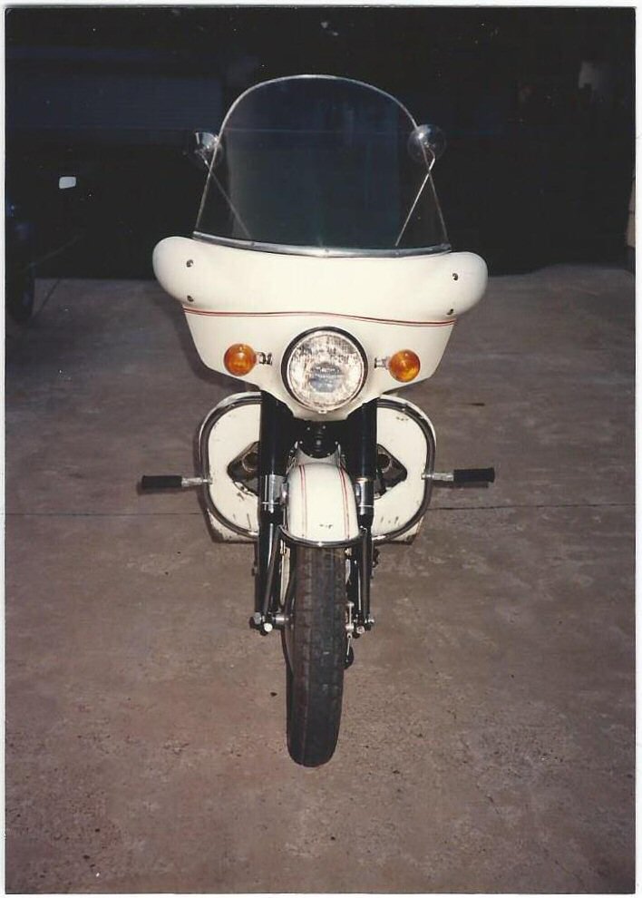 Moto Guzzi polizia fairing mounted to an A-series Ambassador.