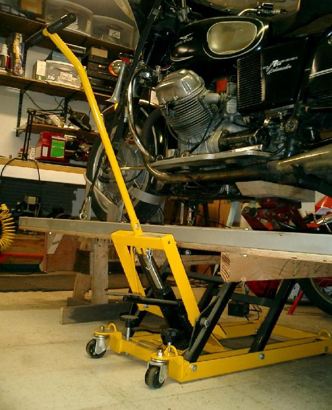 Harbor Freight bike jack in position under bike platform.