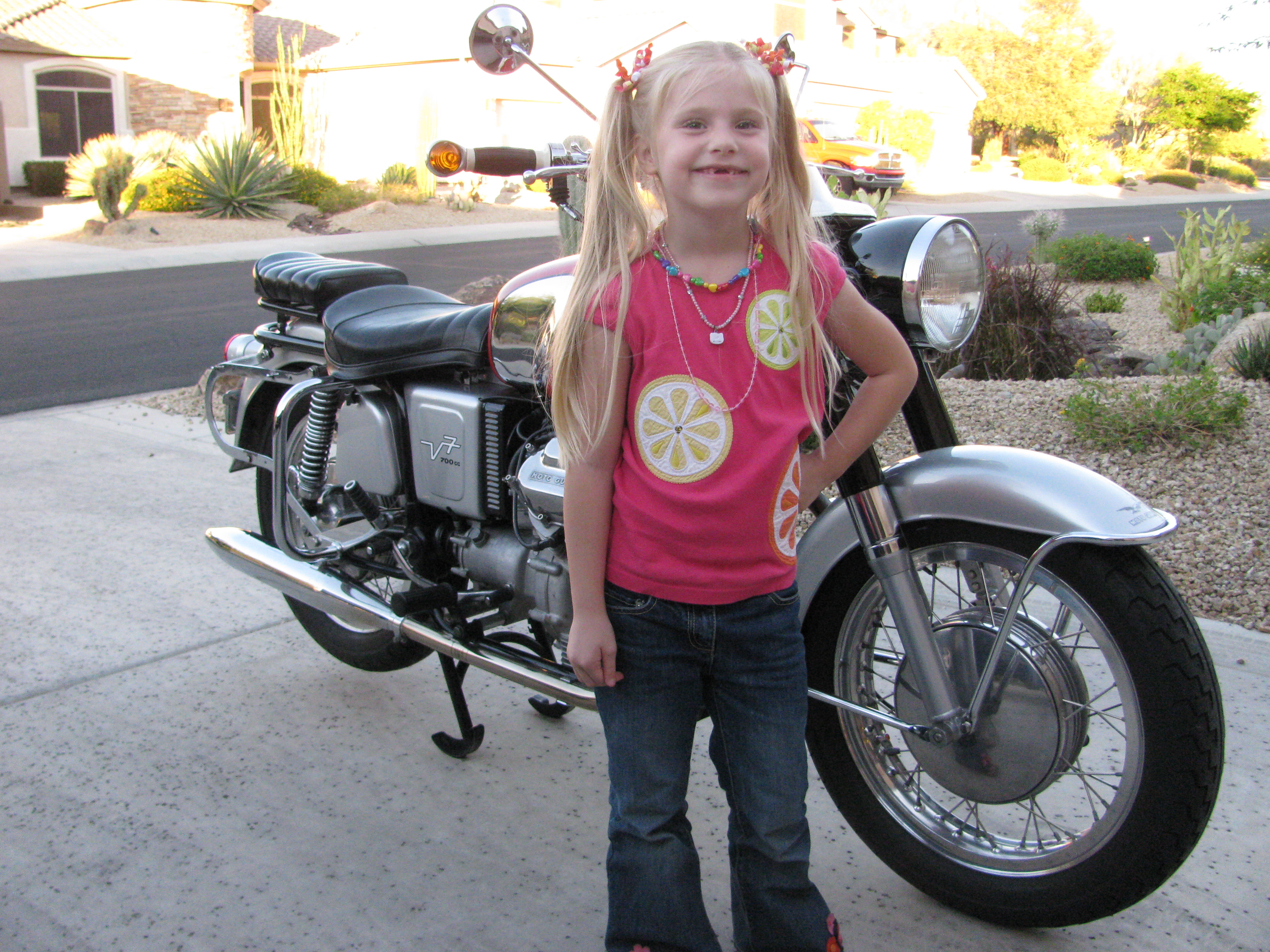 Robert Scharf's Moto Guzzi V700 with Darby Anne Bender.