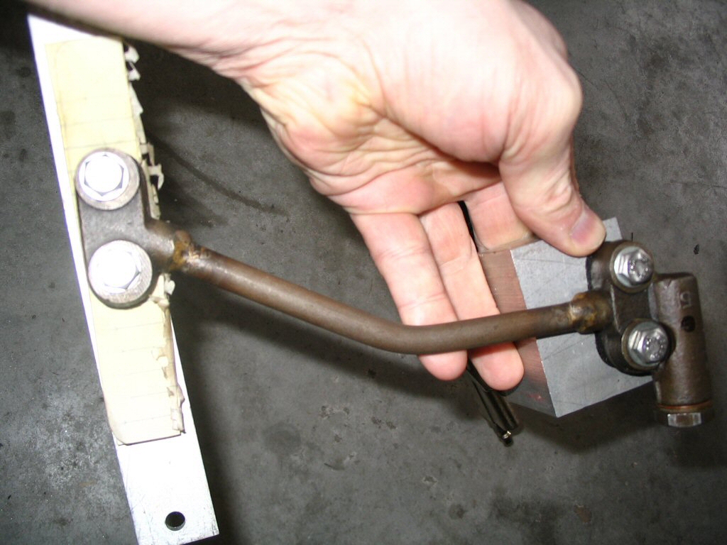 Pressure tester for an oil pressure relief valve.